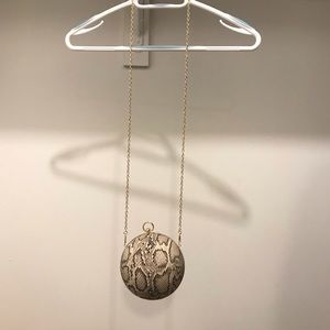 Sphere snake pattern cross body bag